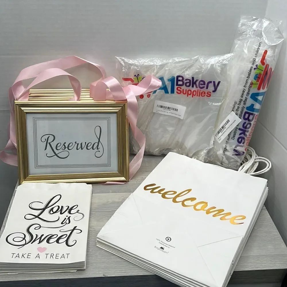 Bundle of Wedding supplies frames bags aisle bows welcome bags
